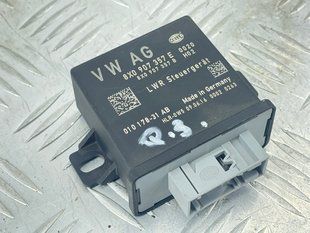 Блок керування коректором фар 8X0907357E Audi Q3