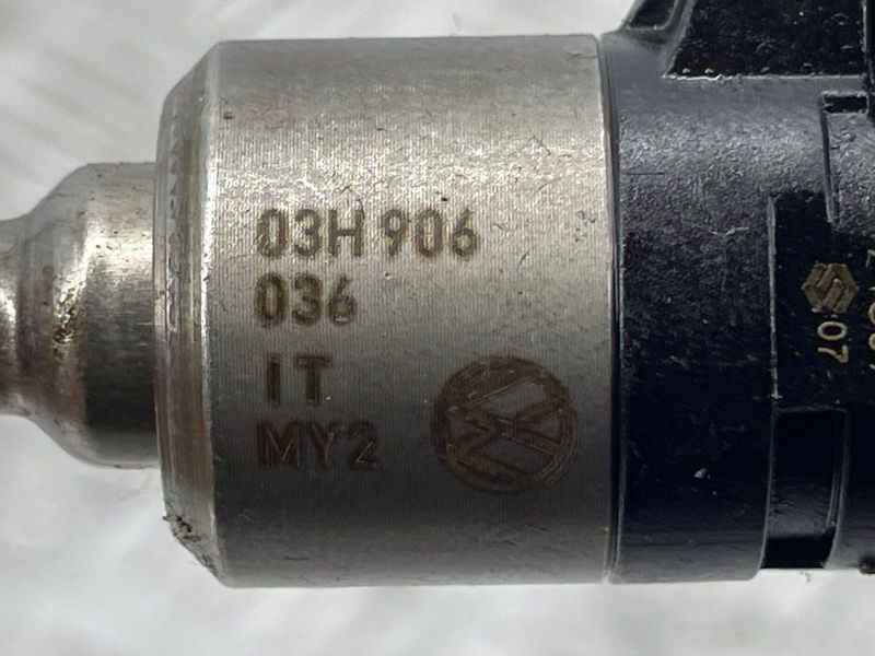 Паливна форсунка 03H906036 Audi Q7