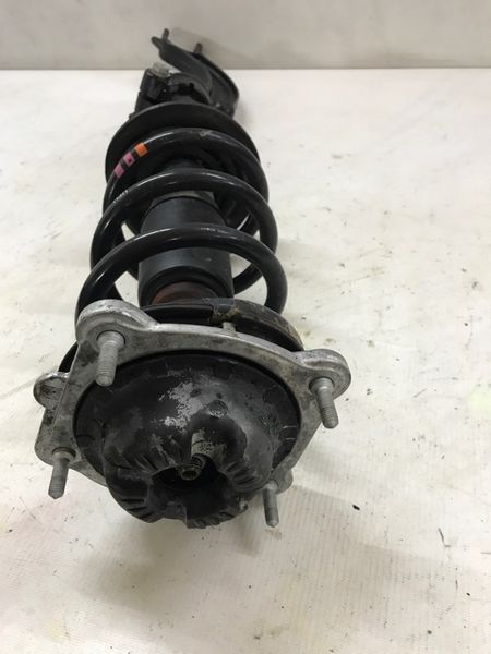 Стойка амортизатора в сборе с пружиной 4G0413031N Audi A6