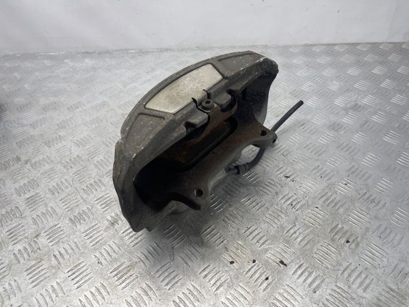 Суппорт тормозной 4G0615124B Audi A6