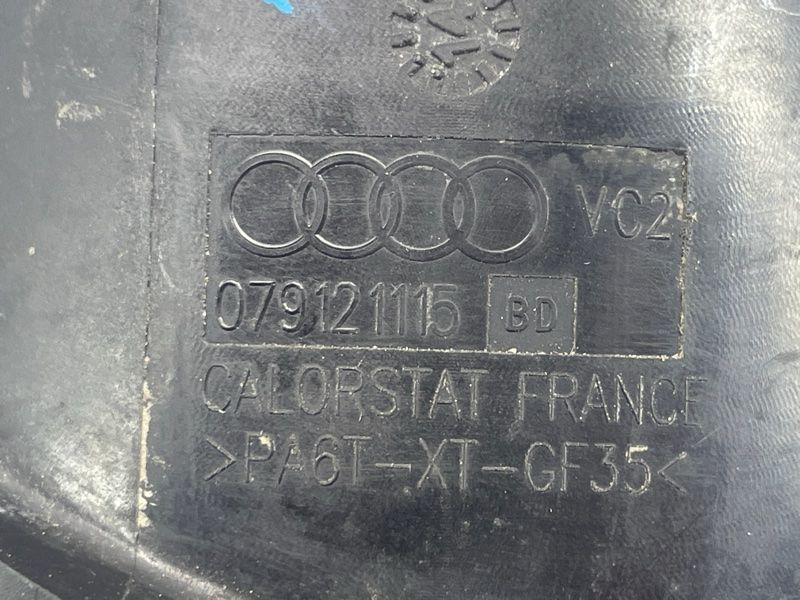 Помпа водяная с корпусом термостата 079121013 Audi A8