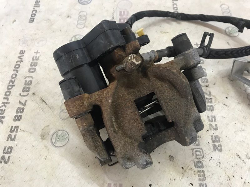 Супорт гальмівний DG9C2D250A Ford Fusion