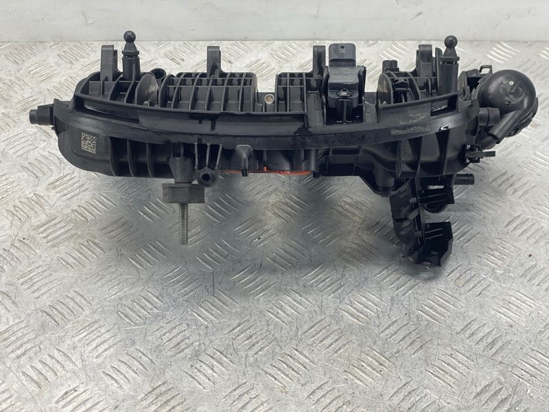 Колектор впускний 06L133201DH Audi A4