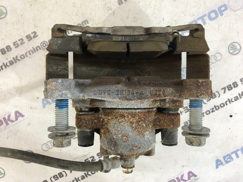 Супорт гальмівний DG9C2B134A Ford Fusion