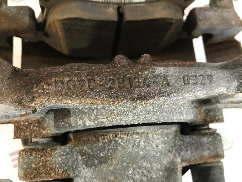 Суппорт тормозной DG9C2B302AB Ford Fusion