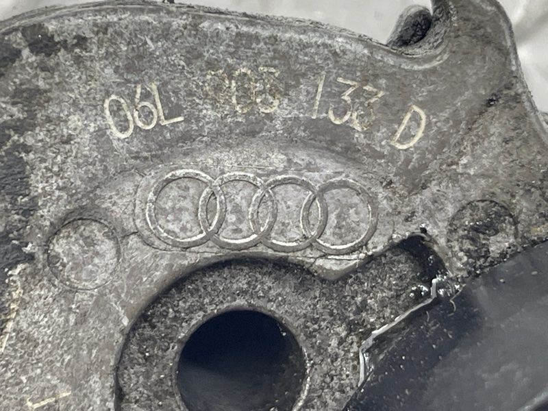 Ролик натяжной 06L903133D Audi A6