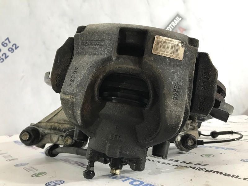 Суппорт тормозной DG9C2B302AB Ford Fusion