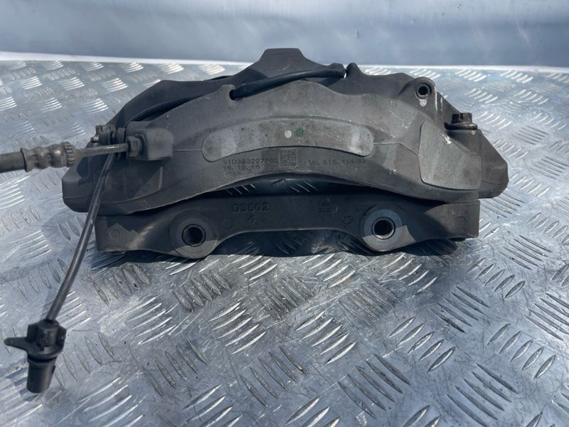 Суппорт тормозной 4M0615106BG Audi Q7