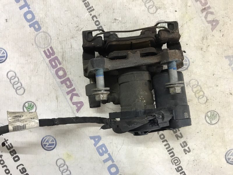 Супорт гальмівний DG9C2D251A Ford Fusion