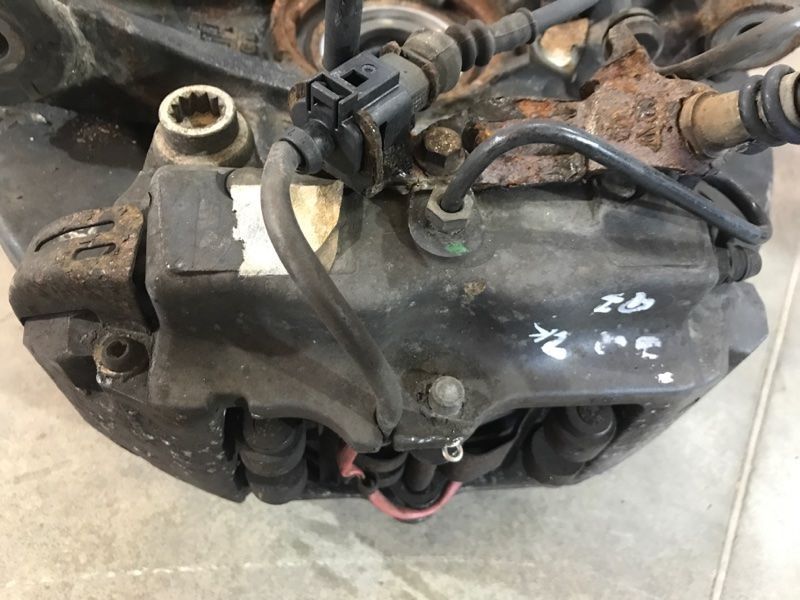 Суппорт тормозной 7L6615423L Audi Q7
