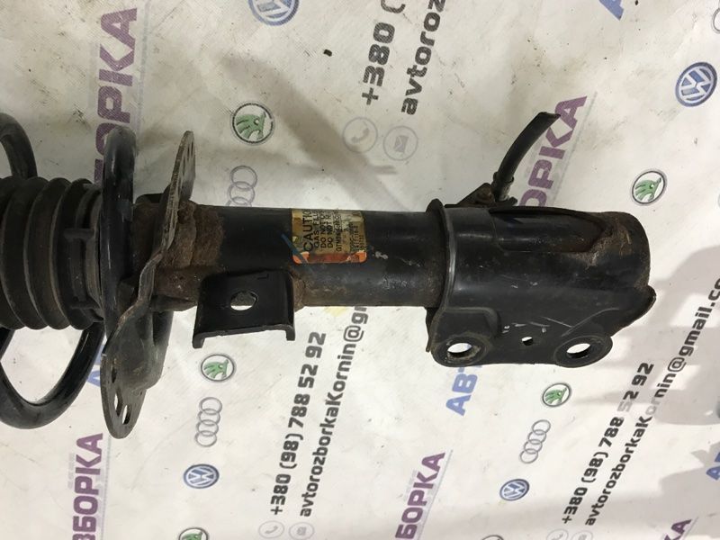 Стійка амортизатора в зборі з пружиною DG9C18K001 Ford Fusion