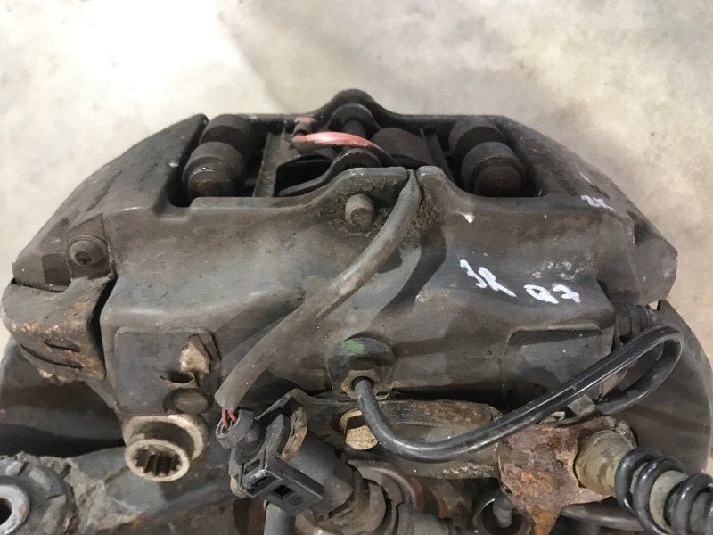 Суппорт тормозной 7L6615424L Audi Q7