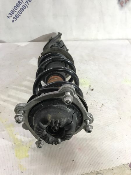 Стійка амортизатора в зборі з пружиною 4G0413031D Audi A7