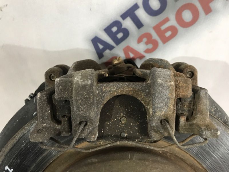 Супорт гальмівний DG9T2B254AH Ford Fusion