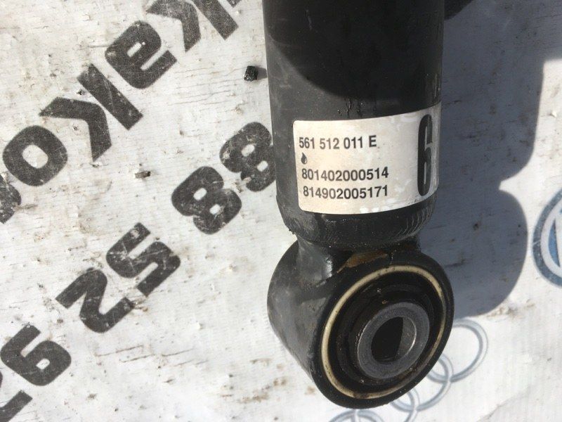 Стойка амортизатора 561512011E Volkswagen Passat