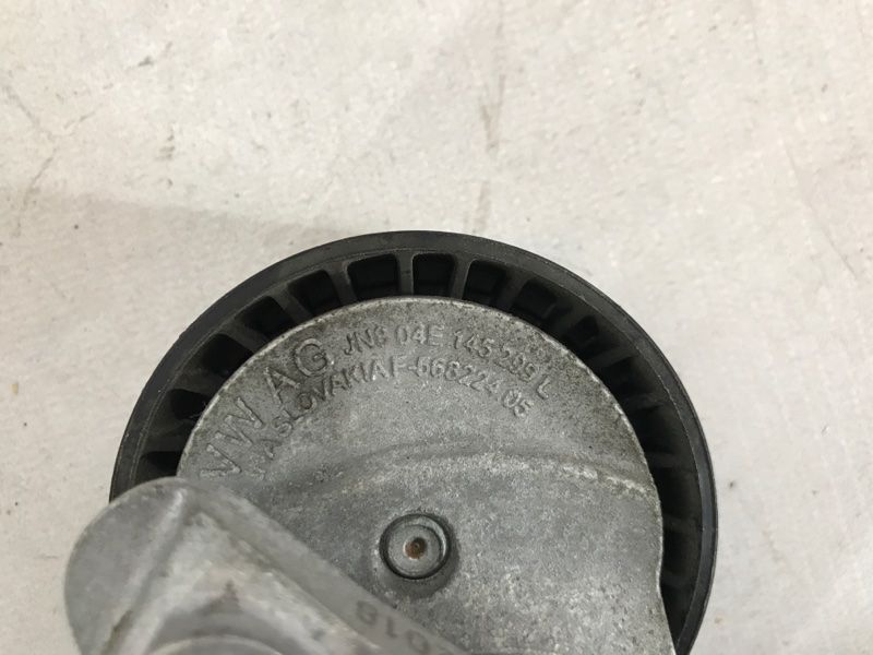 Ролик натяжной 04E145299L Volkswagen Jetta