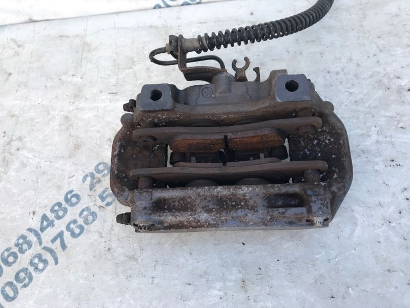 Суппорт тормозной 7P0615423 Volkswagen Touareg