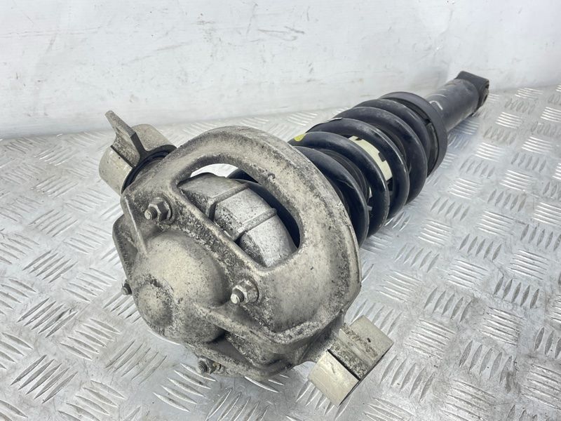 Стійка амортизатора 7L8513029K Audi Q7
