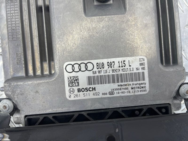 Блок управления двигателем 8U0907115L Audi Q3
