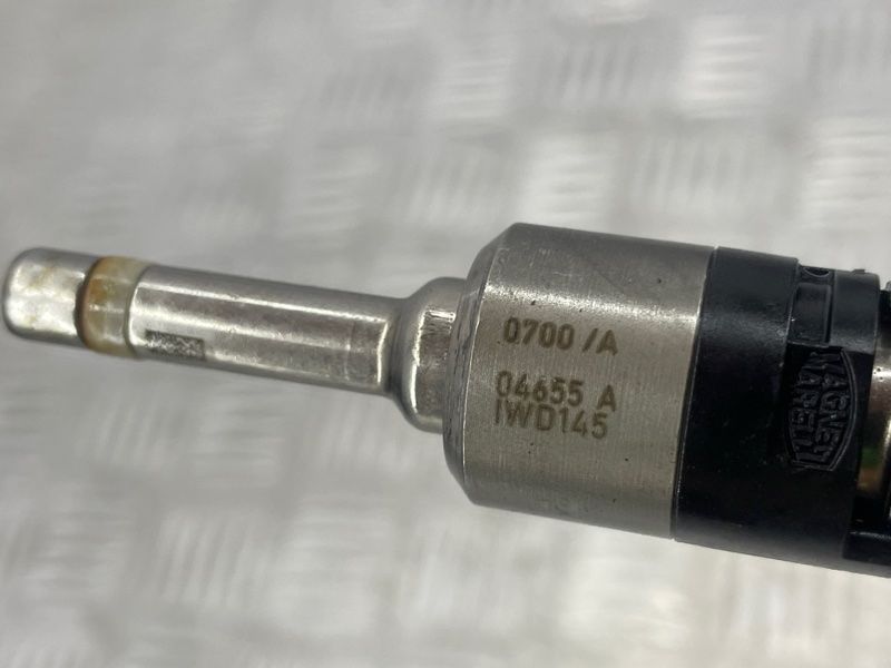 Паливна форсунка 03H906036A Audi Q7