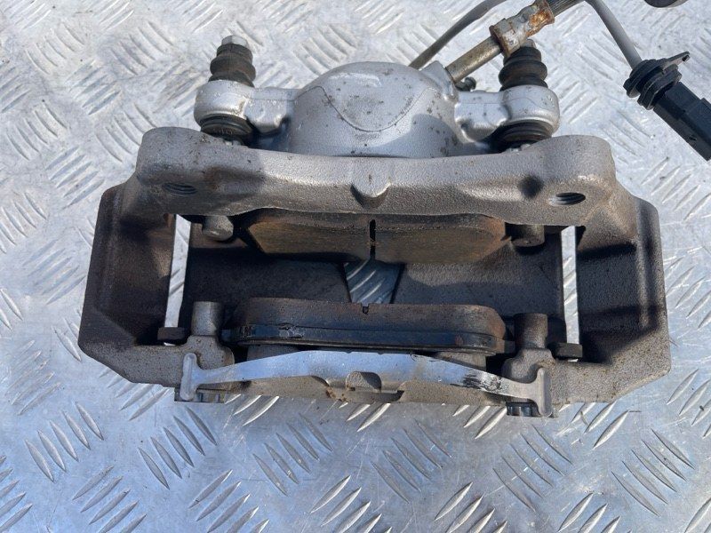 Суппорт тормозной 4G0615123C Audi A6