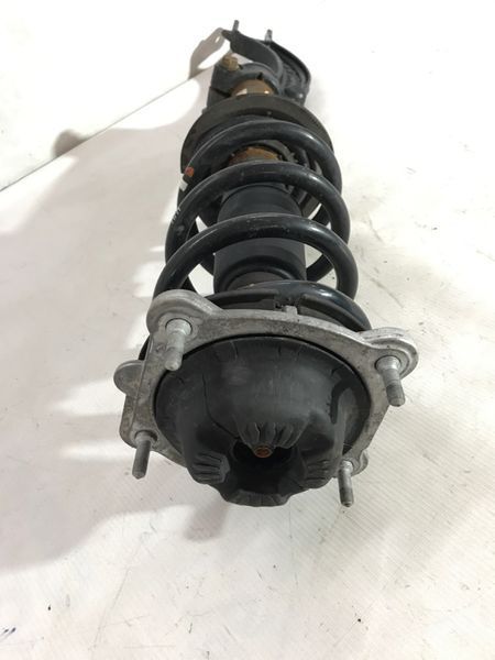 Стойка амортизатора в сборе с пружиной 4G0413031AF Audi A6