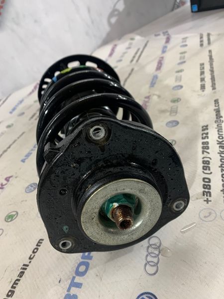 Стойка амортизатора в сборе с пружиной 561413031K Volkswagen Passat