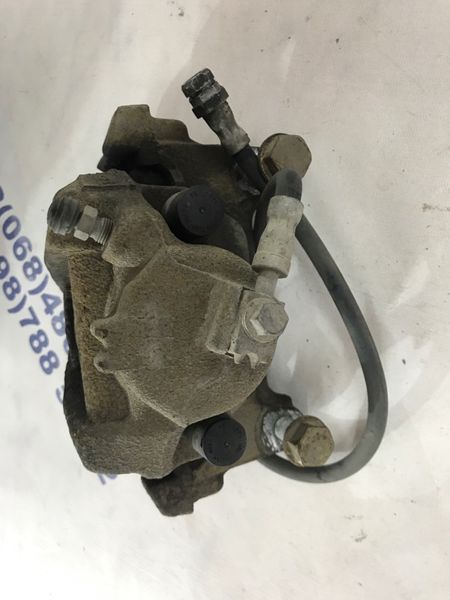 Суппорт тормозной 5N0615124 Volkswagen Tiguan