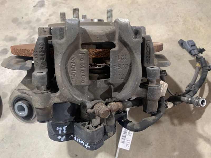 Супорт гальмівний DG9C2B713A Ford Fusion