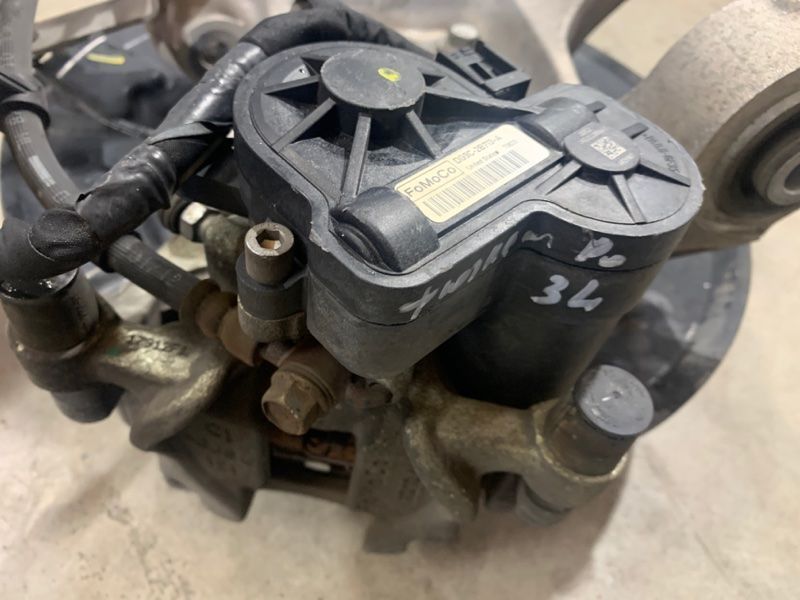 Супорт гальмівний DG9C2B713A Ford Fusion