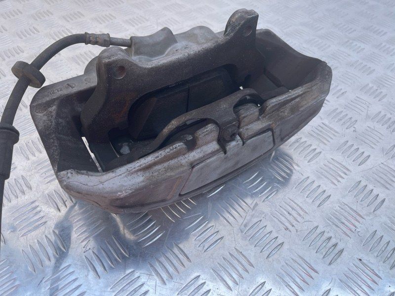Супорт гальмівний 4G0615124E Audi A6