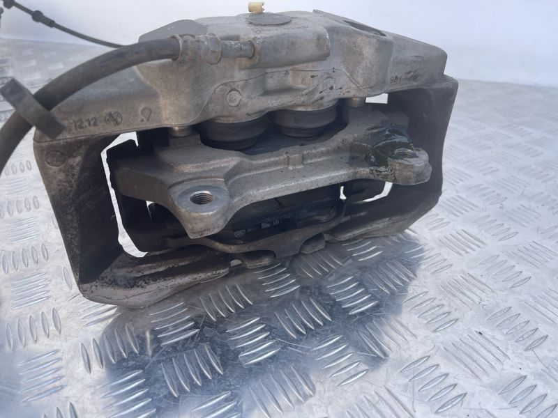 Супорт гальмівний 4G0615124E Audi A6