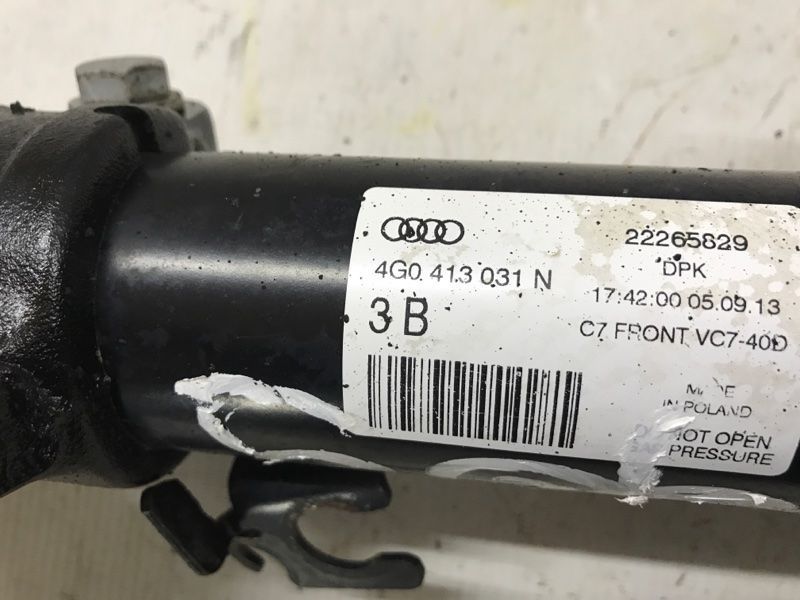 Стійка амортизатора в зборі з пружиною 4G0413031N Audi A6